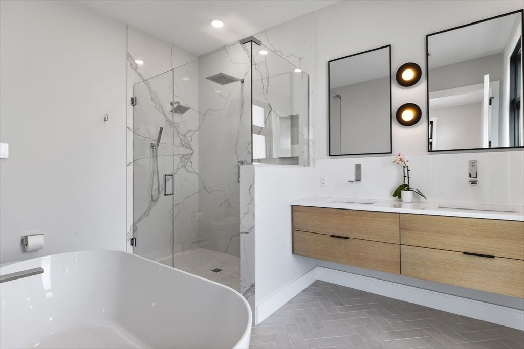Bathroom, Dual Sink Vanities, Free Standing Baths, Glass Shower, Interior, Marble Walls, Recessed Lighting