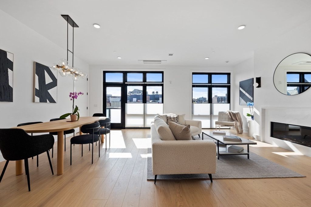 Dining room, Fireplace, Interior, Living room, Pendant Lights, Recessed Lighting, Wood Texture Flooring