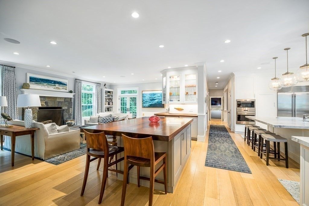 Dining room, Fireplace, Interior, Kitchen, Living room, Pendant Lights, Recessed Lighting, Stainless Steel Appliances, Wood Texture Flooring