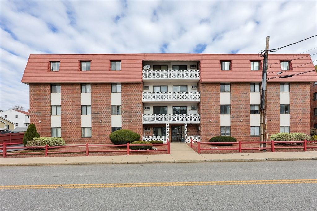 Exterior, Facade, Brick Facade, Condo Building