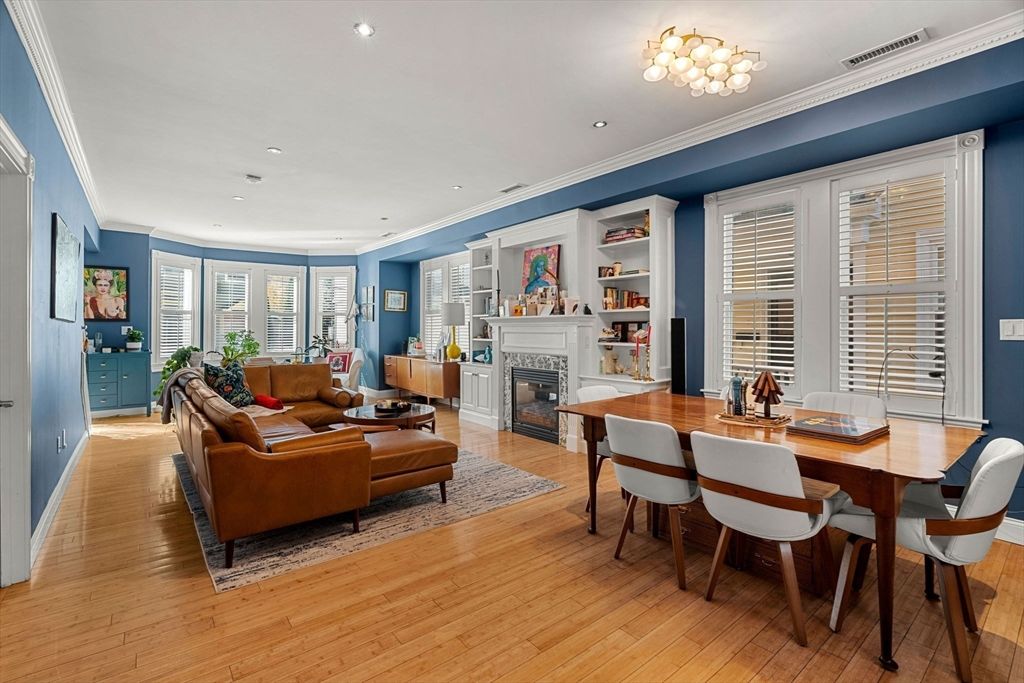 Dining room, Fireplace, Interior, Living room, Recessed Lighting, Wood Texture Flooring
