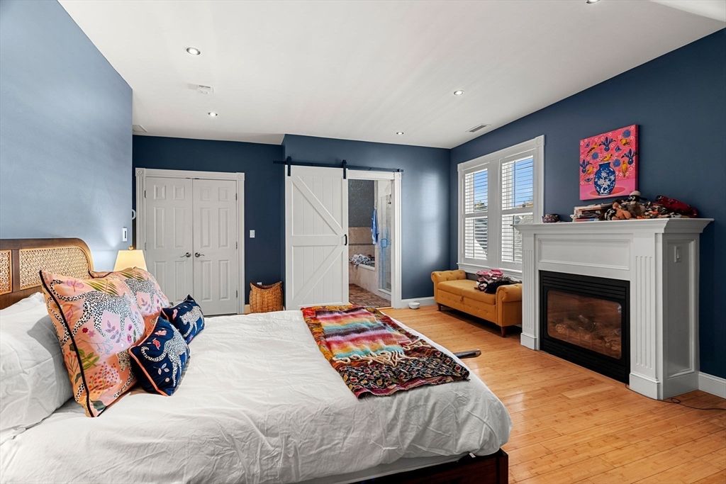 Bedroom, Fireplace, Interior, Recessed Lighting, Wood Texture Flooring