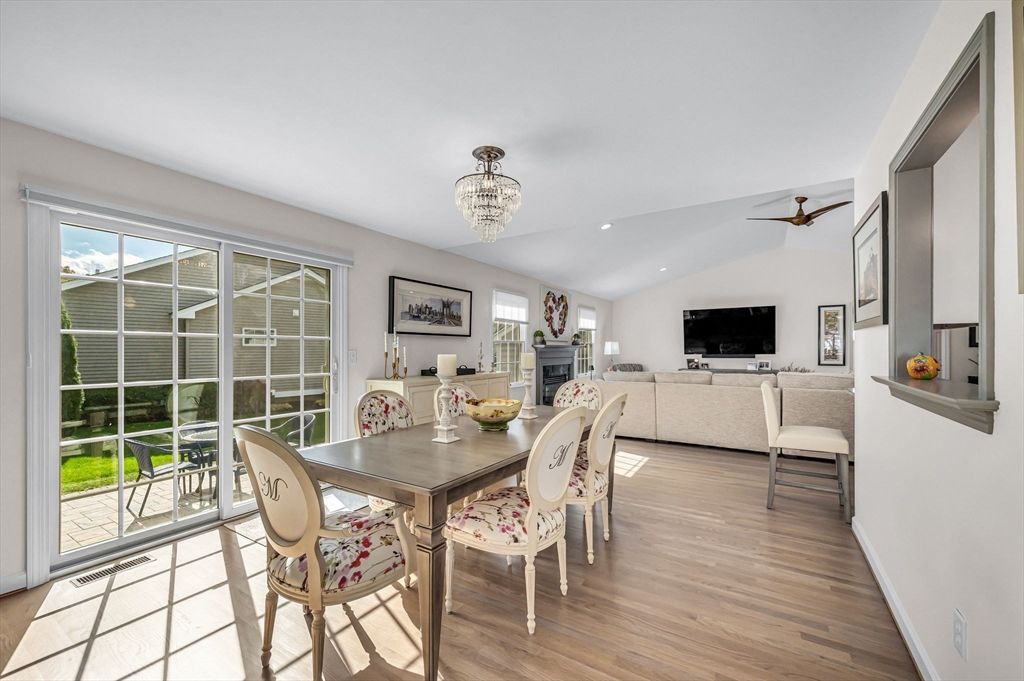 Chandelier, Dining room, Fireplace, Interior, Living room, Recessed Lighting, Wood Texture Flooring