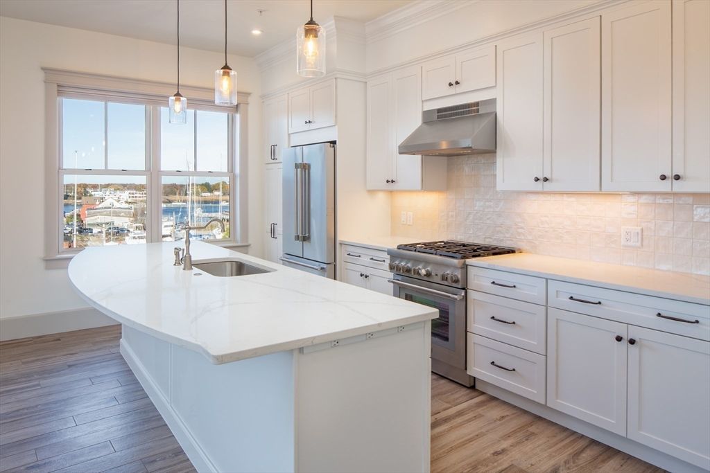 Interior, Kitchen, Pendant Lights, Recessed Lighting, Stainless Steel Appliances, Wood Texture Flooring