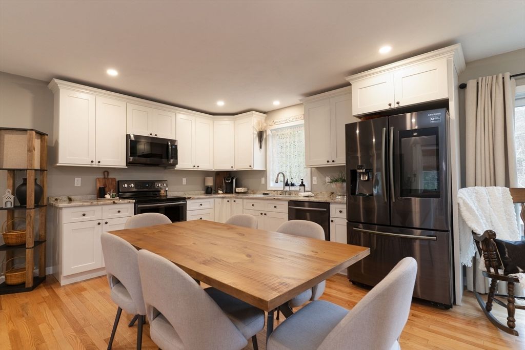 Dining room, Interior, Kitchen, Recessed Lighting, Stainless Steel Appliances, Wood Texture Flooring