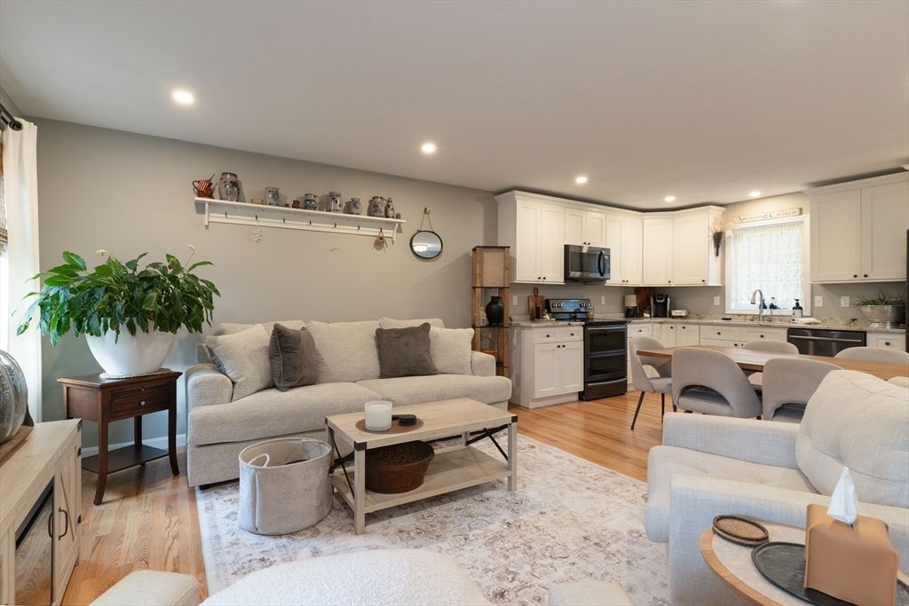 Dining room, Interior, Kitchen, Living room, Recessed Lighting, Stainless Steel Appliances, Wood Texture Flooring