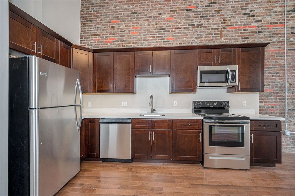 Interior, Kitchen, Stainless Steel Appliances, Stone Walls, Wood Texture Flooring