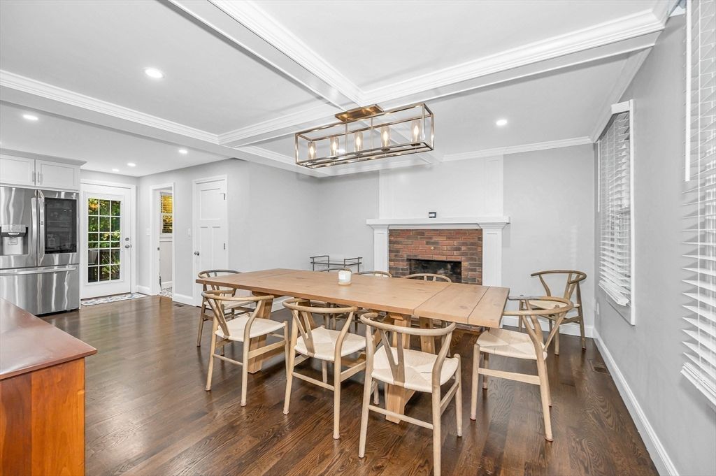 Dining room, Fireplace, Interior, Kitchen, Recessed Lighting, Stainless Steel Appliances, Wood Texture Flooring