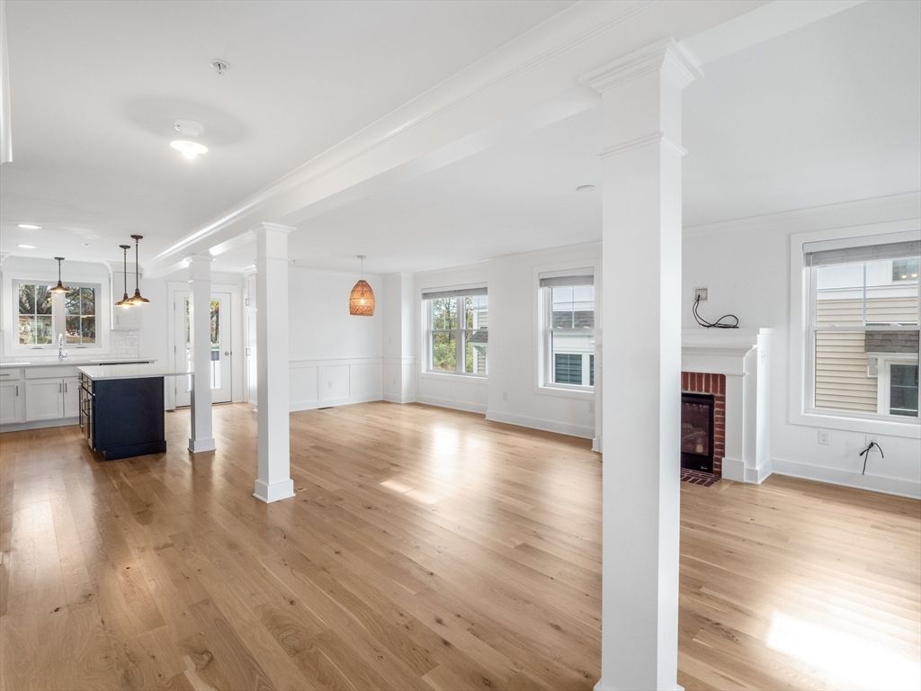 Empty room, Fireplace, Interior, Kitchen, Pendant Lights, Wood Texture Flooring