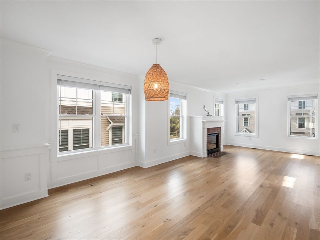 Empty room, Fireplace, Interior, Pendant Lights, Wood Texture Flooring