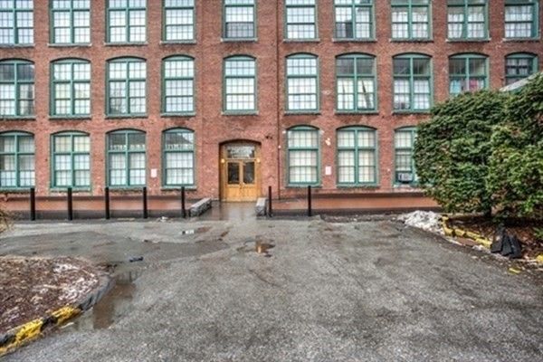 Exterior, Facade, Brick Facade, Condo Building