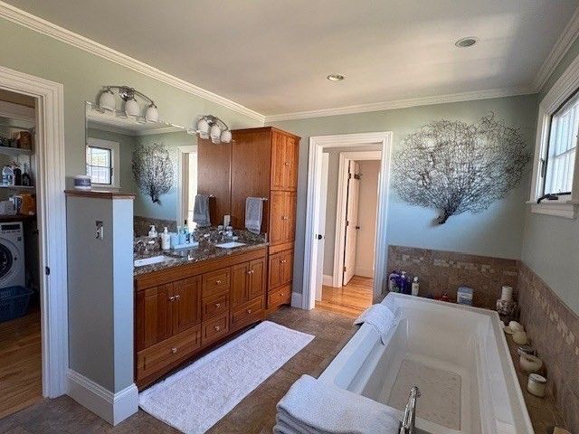 Bathroom, Dual Sink Vanities, Interior, Recessed Lighting, Washer, Wood Texture Flooring
