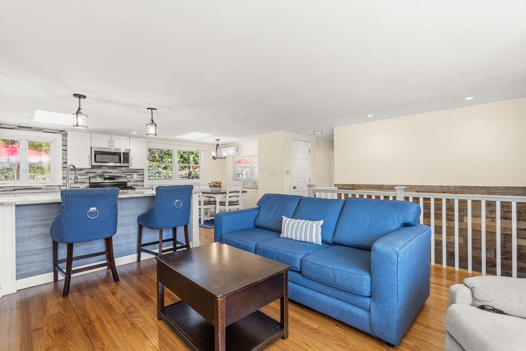 Dining room, Interior, Kitchen, Living room, Recessed Lighting, Stainless Steel Appliances, Wood Texture Flooring