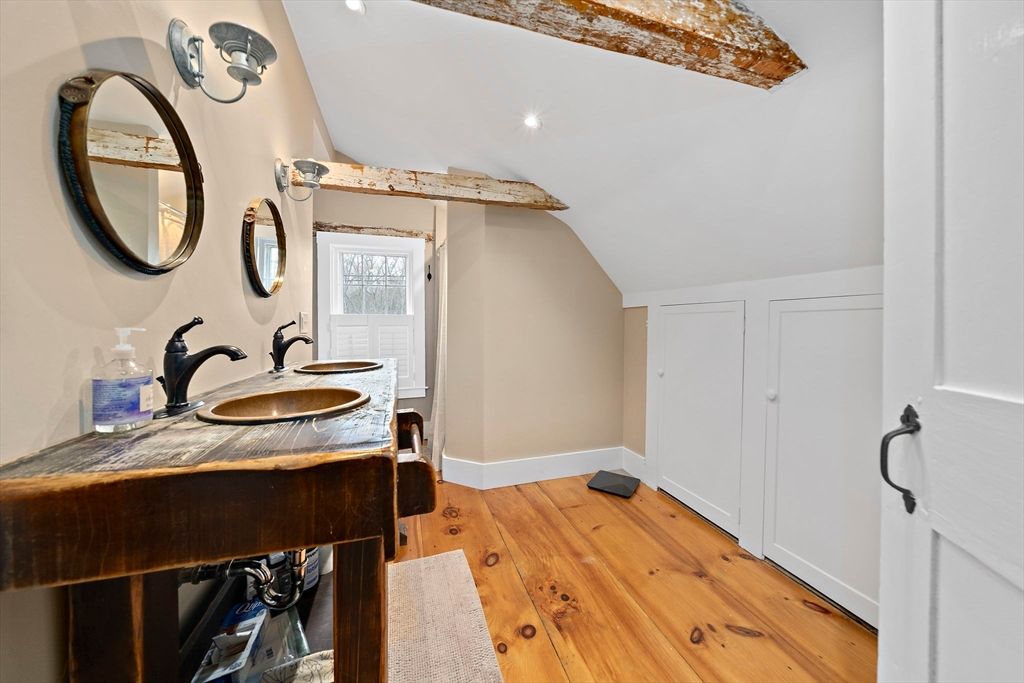 Bathroom, Dual Sink Vanities, Interior, Recessed Lighting, Wood Texture Flooring