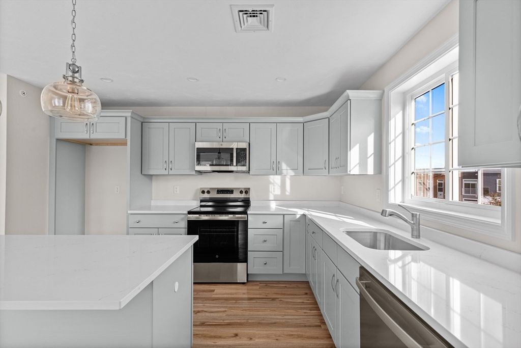 Interior, Kitchen, Pendant Lights, Recessed Lighting, Stainless Steel Appliances, Wood Texture Flooring