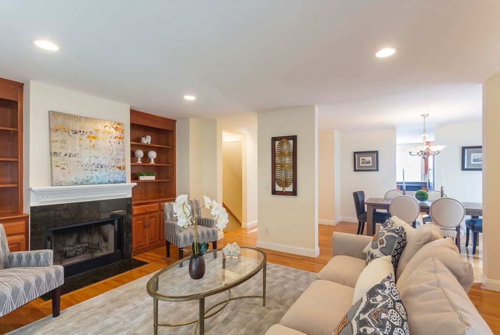 Chandelier, Dining room, Fireplace, Interior, Living room, Recessed Lighting, Wood Texture Flooring