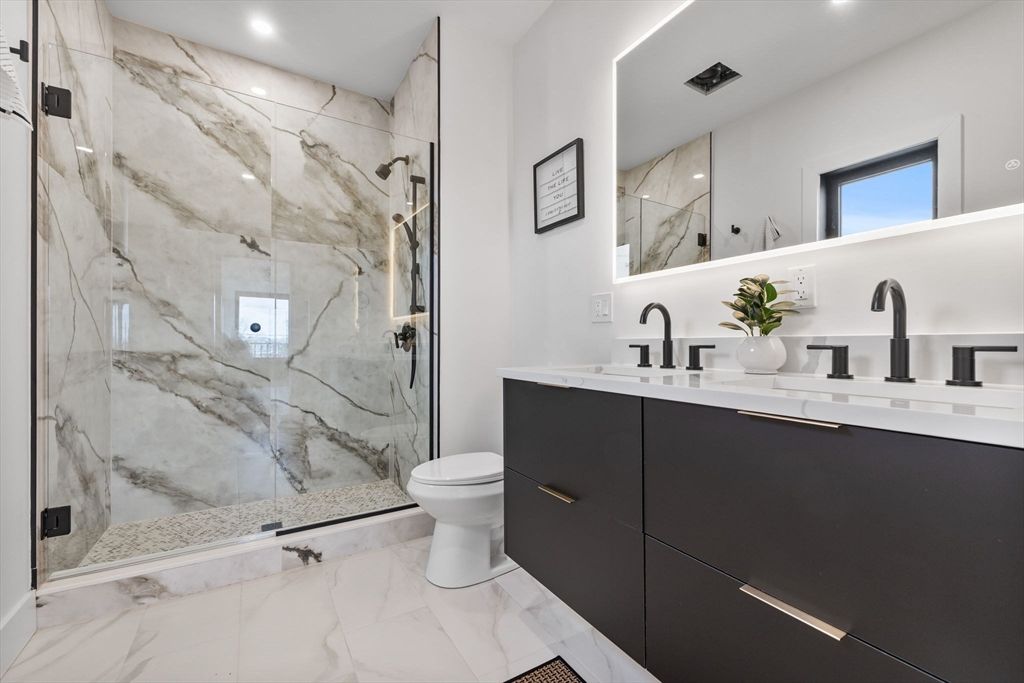 Bathroom, Dual Sink Vanities, Glass Shower, Interior, Marble, Marble Walls, Recessed Lighting