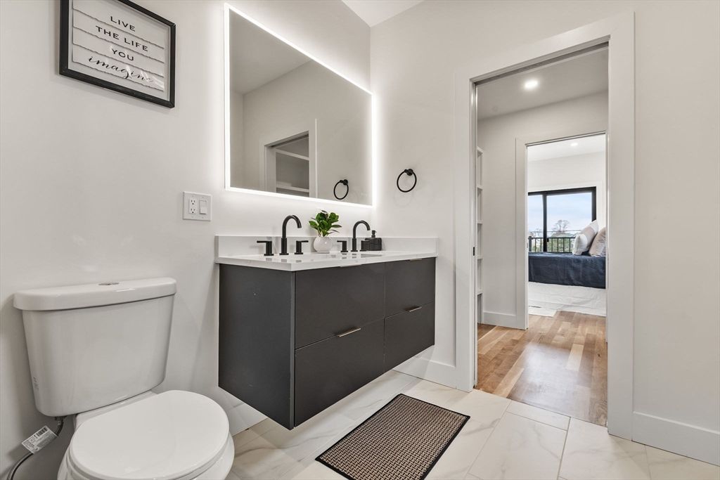 Bathroom, Bedroom, Dual Sink Vanities, Interior, Marble, Recessed Lighting, Wood Texture Flooring