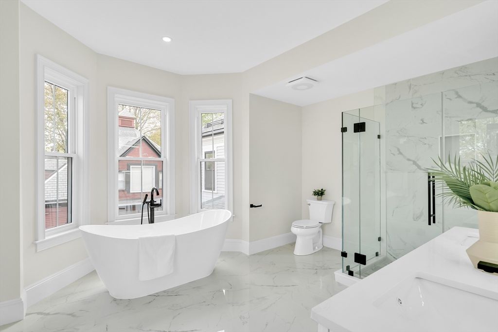 Bathroom, Free Standing Baths, Glass Shower, Interior, Marble, Marble Walls, Recessed Lighting