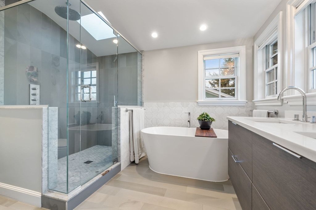 Bathroom, Dual Sink Vanities, Free Standing Baths, Glass Shower, Interior, Recessed Lighting, Wood Texture Flooring