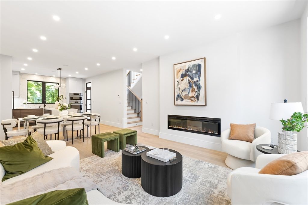 Dining room, Fireplace, Interior, Kitchen, Living room, Pendant Lights, Recessed Lighting, Stainless Steel Appliances, Wood Texture Flooring