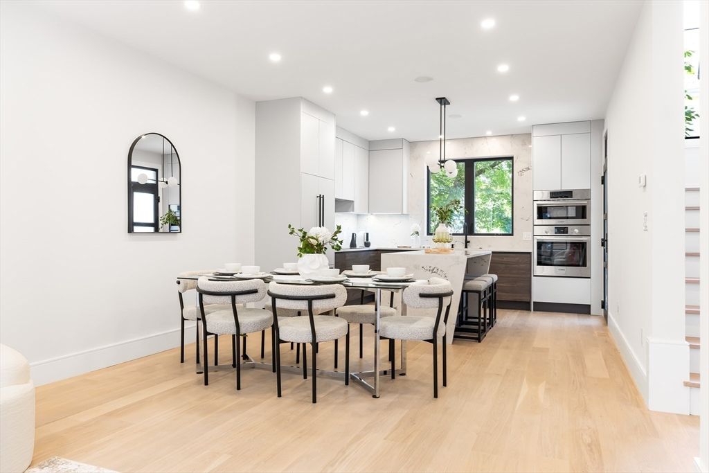 Dining room, Interior, Kitchen, Pendant Lights, Recessed Lighting, Stainless Steel Appliances, Wood Texture Flooring