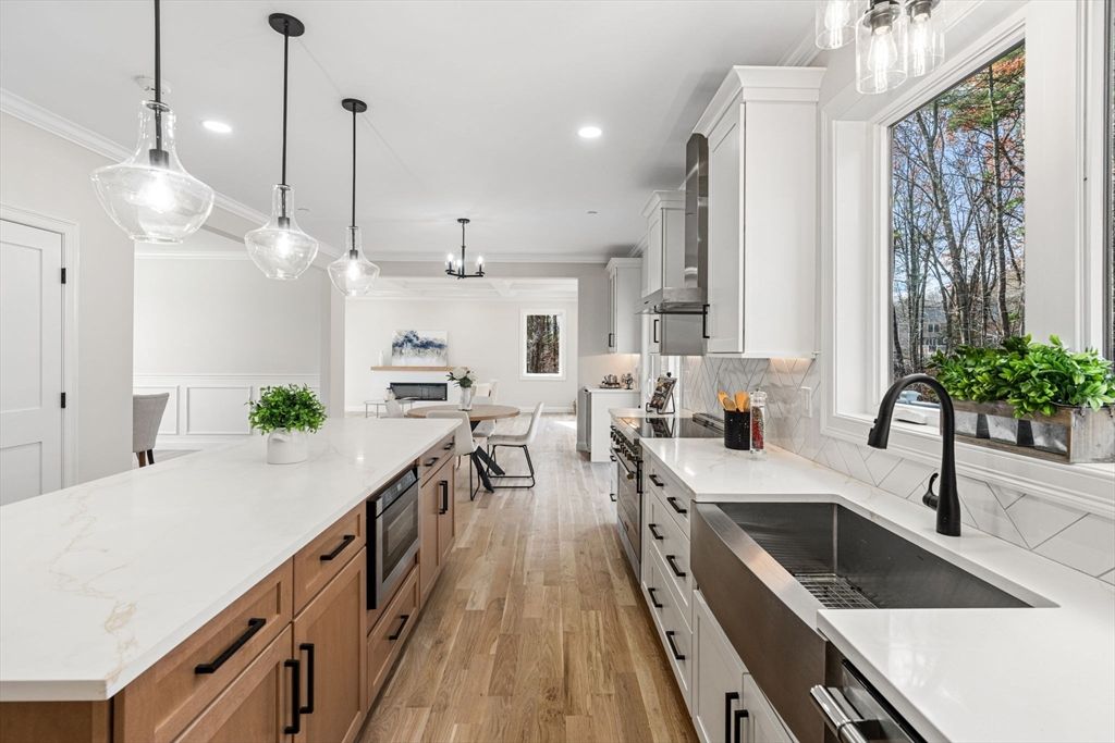 Dining room, Interior, Kitchen, Pendant Lights, Recessed Lighting, Stainless Steel Appliances, Wood Texture Flooring
