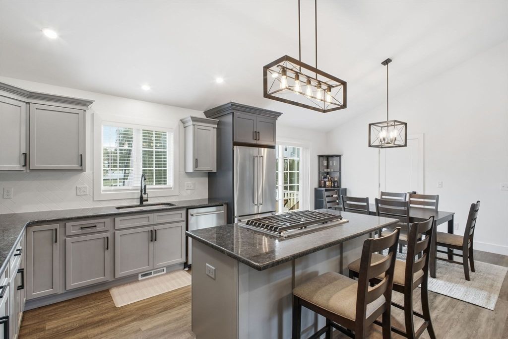 Dining room, Interior, Kitchen, Pendant Lights, Recessed Lighting, Stainless Steel Appliances, Wood Texture Flooring