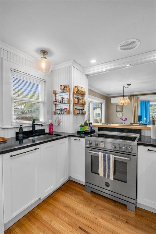 Chandelier, Interior, Kitchen, Recessed Lighting, Stainless Steel Appliances, Wood Texture Flooring