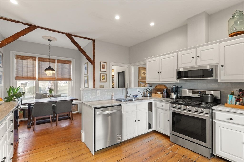 Dining room, Interior, Kitchen, Pendant Lights, Recessed Lighting, Stainless Steel Appliances, Wood Texture Flooring