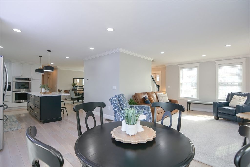 Dining room, Interior, Kitchen, Pendant Lights, Recessed Lighting, Stainless Steel Appliances, Wood Texture Flooring