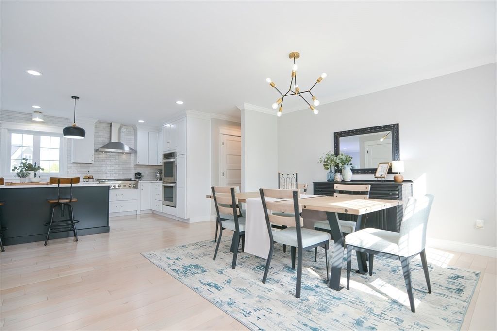 Dining room, Interior, Kitchen, Pendant Lights, Recessed Lighting, Stainless Steel Appliances, Wood Texture Flooring