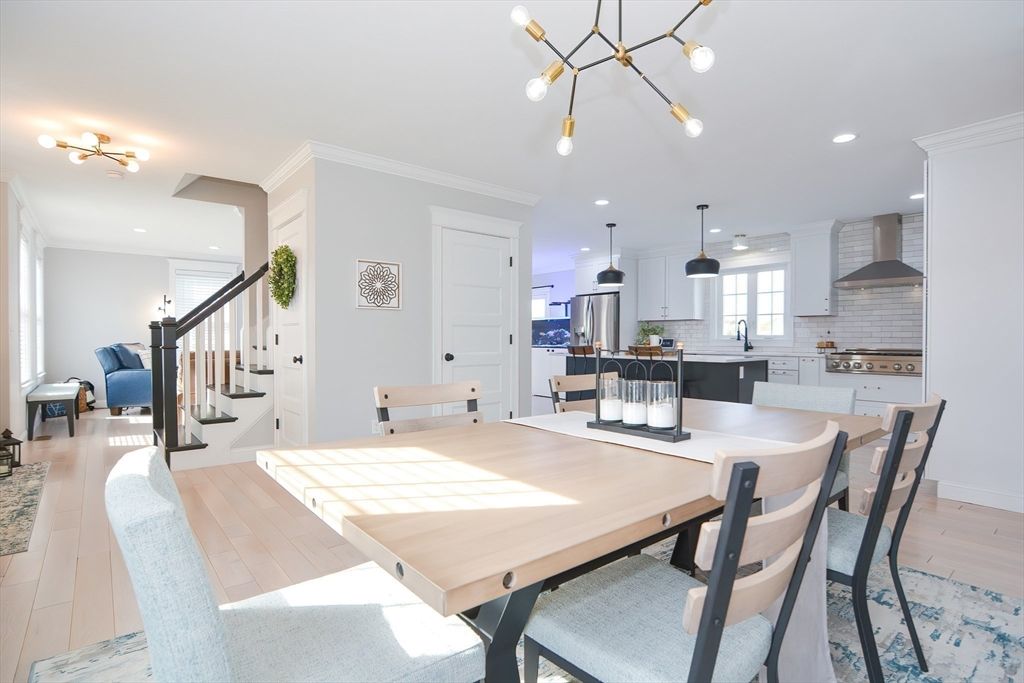 Dining room, Interior, Kitchen, Pendant Lights, Recessed Lighting, Stainless Steel Appliances, Wood Texture Flooring