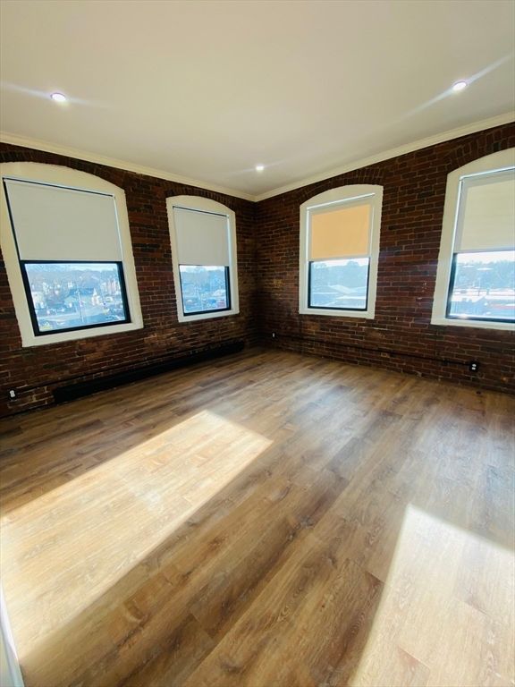 Empty room, Interior, Recessed Lighting, Stone Walls, Wood Texture Flooring