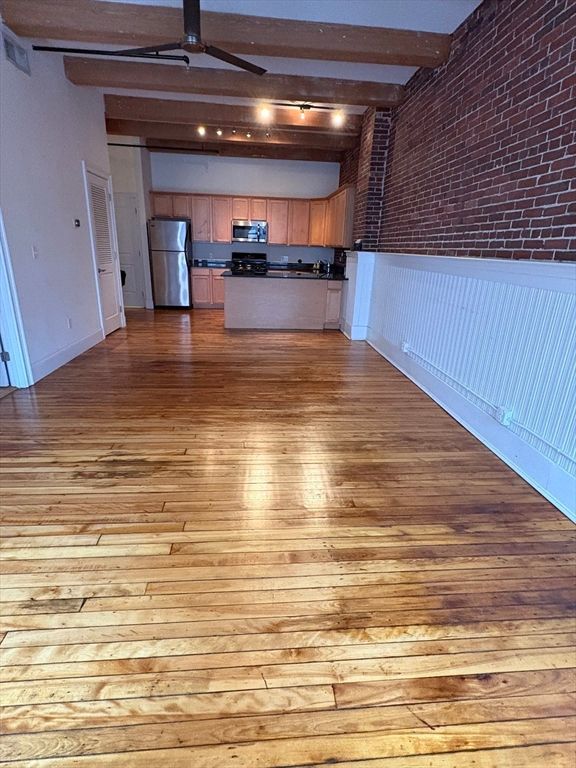 Empty room, Interior, Kitchen, Stainless Steel Appliances, Wood Texture Flooring