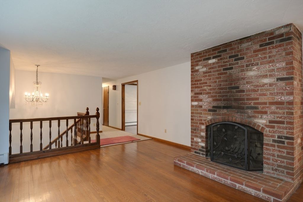 Chandelier, Empty room, Fireplace, Interior, Stone Walls, Wood Texture Flooring