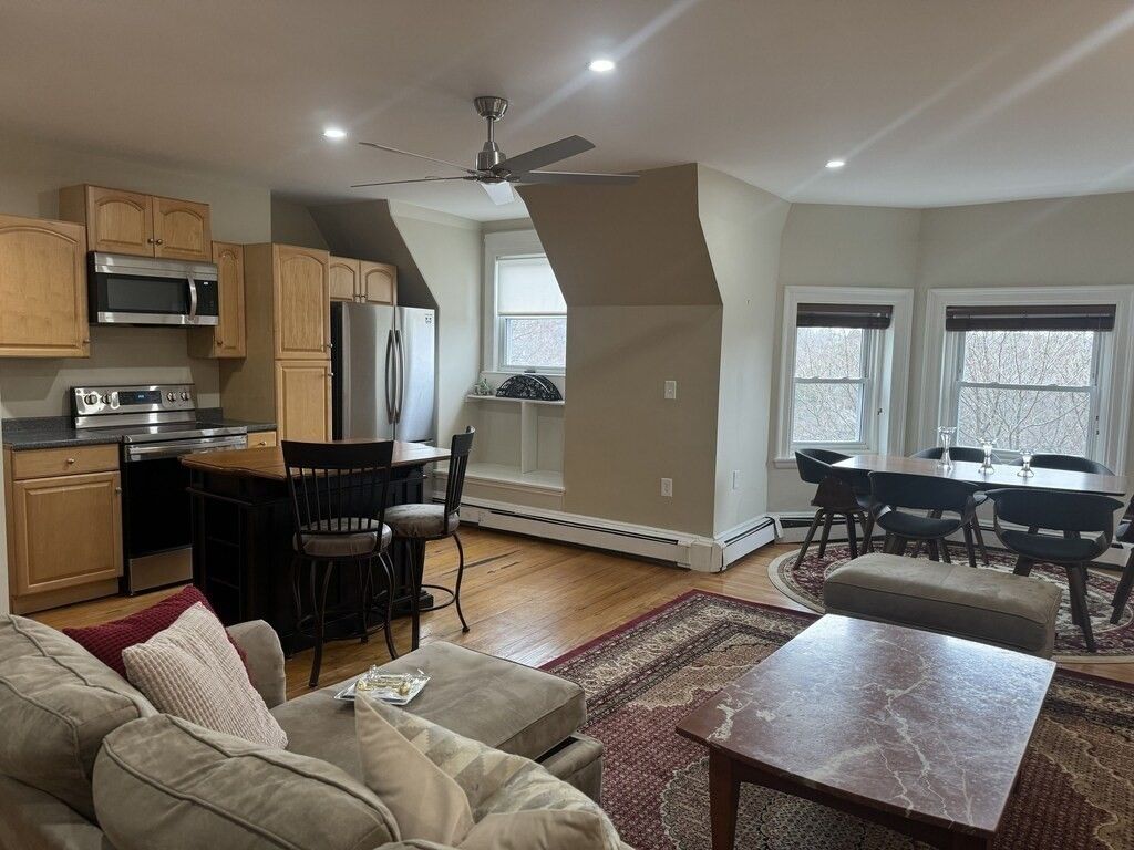 Dining room, Interior, Kitchen, Living room, Recessed Lighting, Stainless Steel Appliances, Wood Texture Flooring