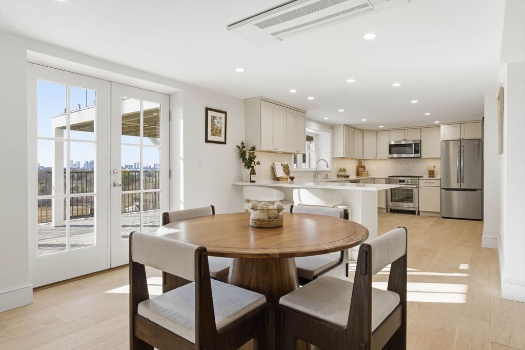 Dining room, Interior, Kitchen, Recessed Lighting, Stainless Steel Appliances, Wood Texture Flooring