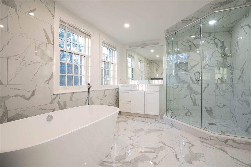 Bathroom, Free Standing Baths, Glass Shower, Interior, Marble, Marble Walls, Recessed Lighting