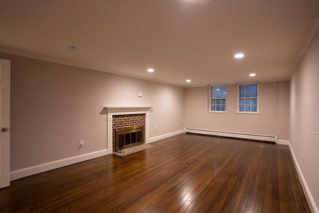 Empty room, Fireplace, Interior, Recessed Lighting, Wood Texture Flooring
