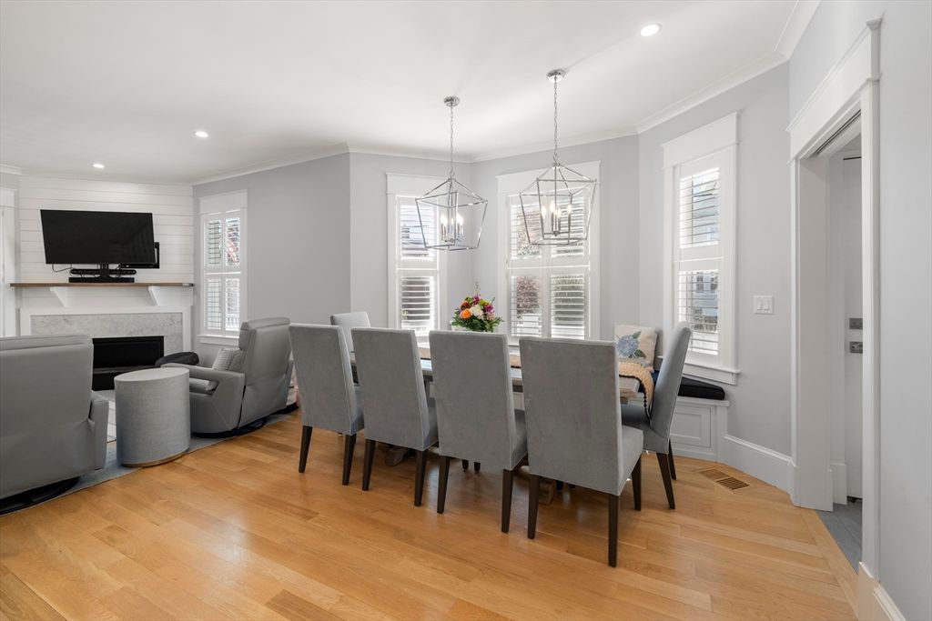 Dining room, Fireplace, Interior, Living room, Pendant Lights, Recessed Lighting, Wood Texture Flooring