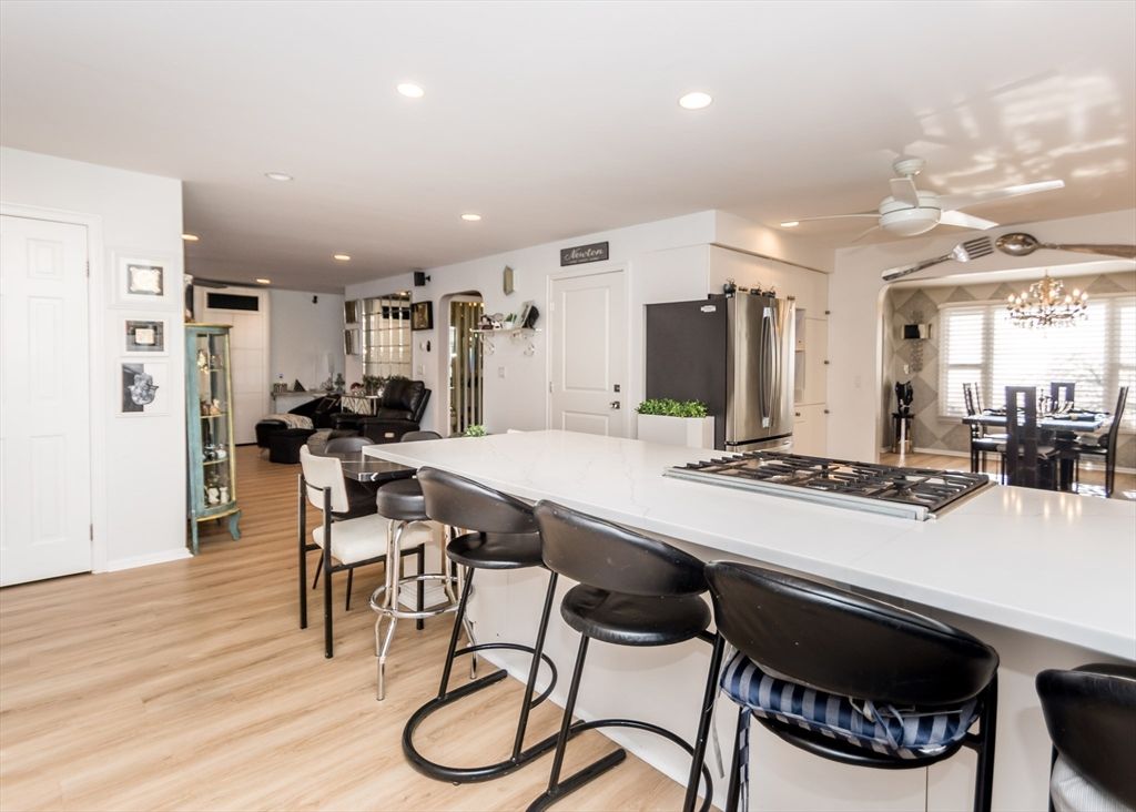 Chandelier, Dining room, Interior, Kitchen, Recessed Lighting, Stainless Steel Appliances, Wood Texture Flooring