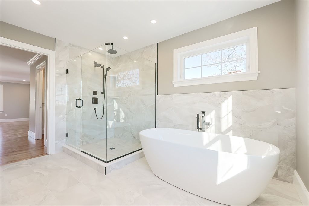 Bathroom, Free Standing Baths, Glass Shower, Interior, Marble, Marble Walls, Recessed Lighting, Wood Texture Flooring