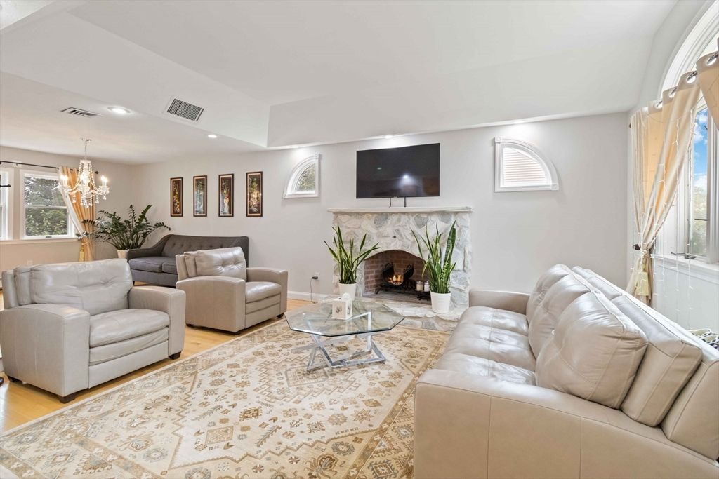 Chandelier, Fireplace, Interior, Living room, Recessed Lighting, Wood Texture Flooring