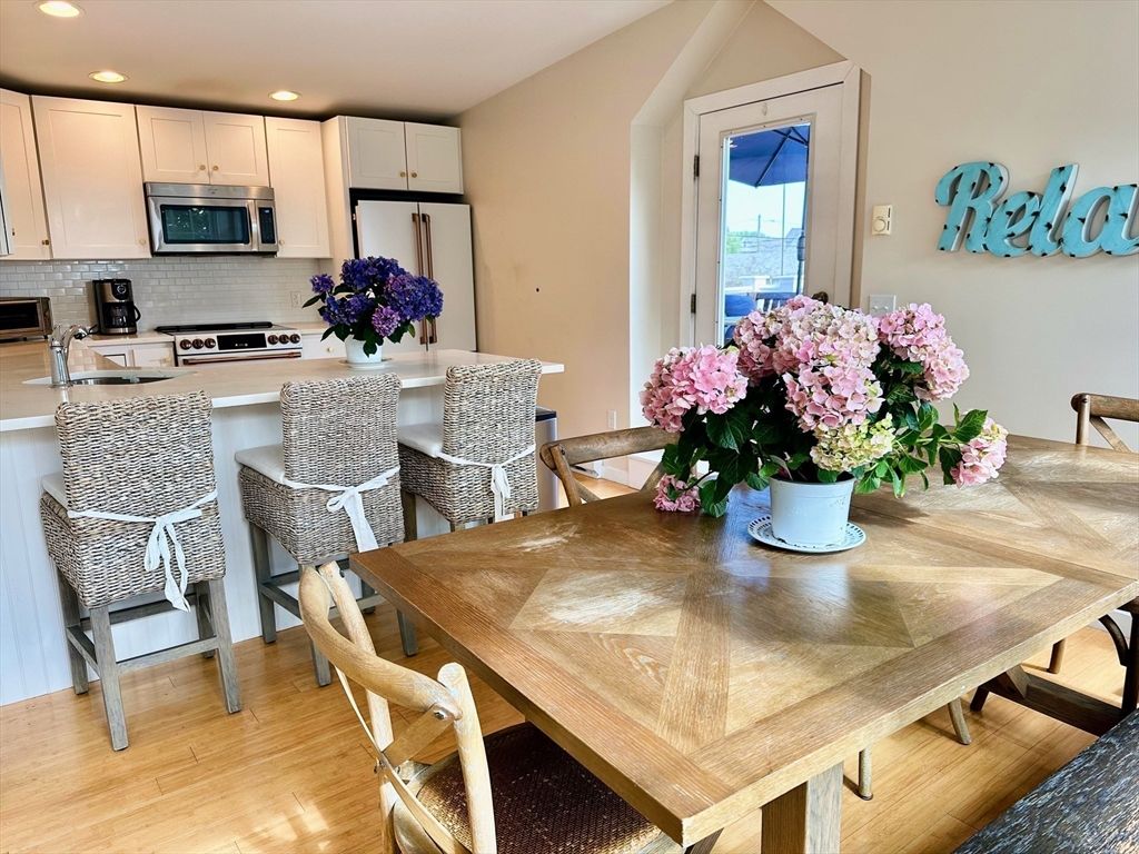 Dining room, Interior, Kitchen, Recessed Lighting, Stainless Steel Appliances, Wood Texture Flooring
