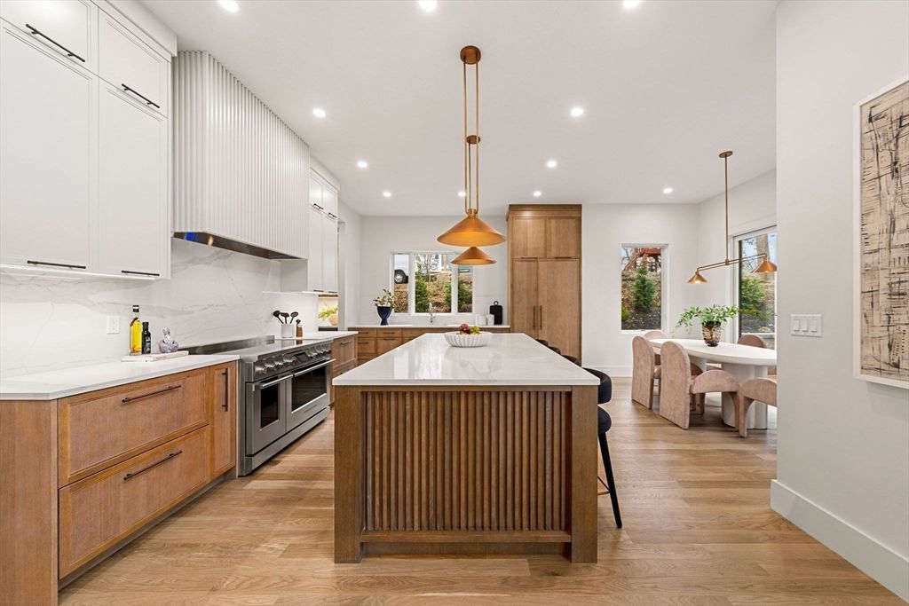 Dining room, Interior, Kitchen, Pendant Lights, Recessed Lighting, Stainless Steel Appliances, Wood Texture Flooring