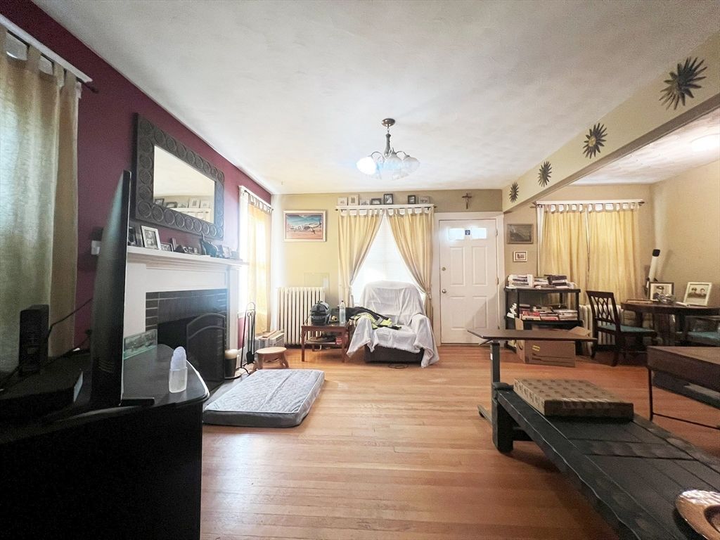 Dining room, Fireplace, Interior, Pendant Lights, Wood Texture Flooring