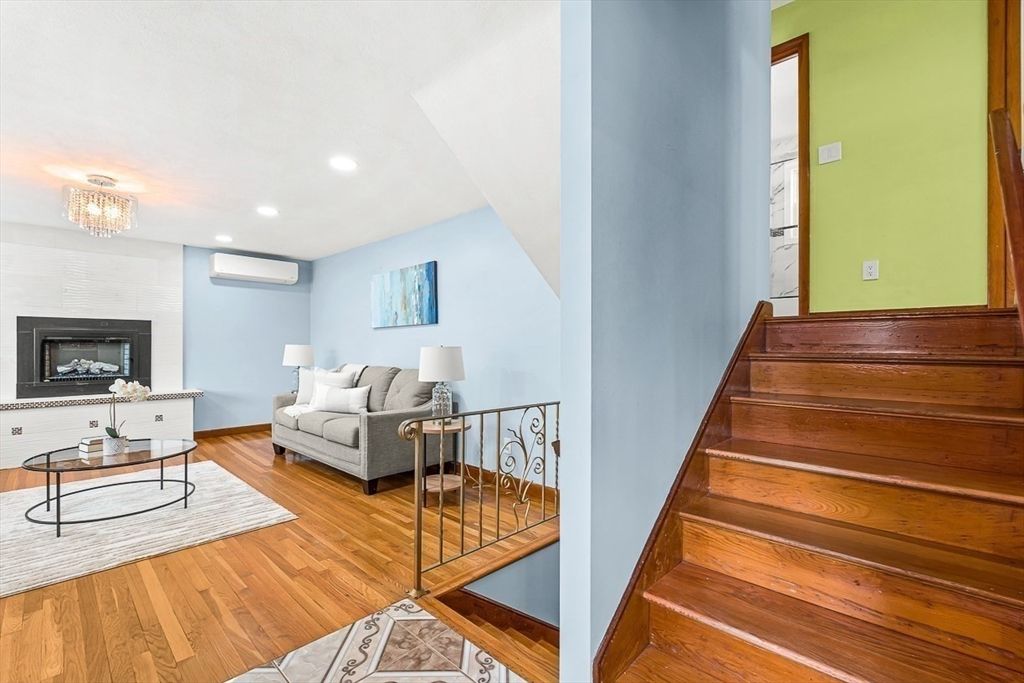 Chandelier, Fireplace, Interior, Recessed Lighting, Wood Texture Flooring