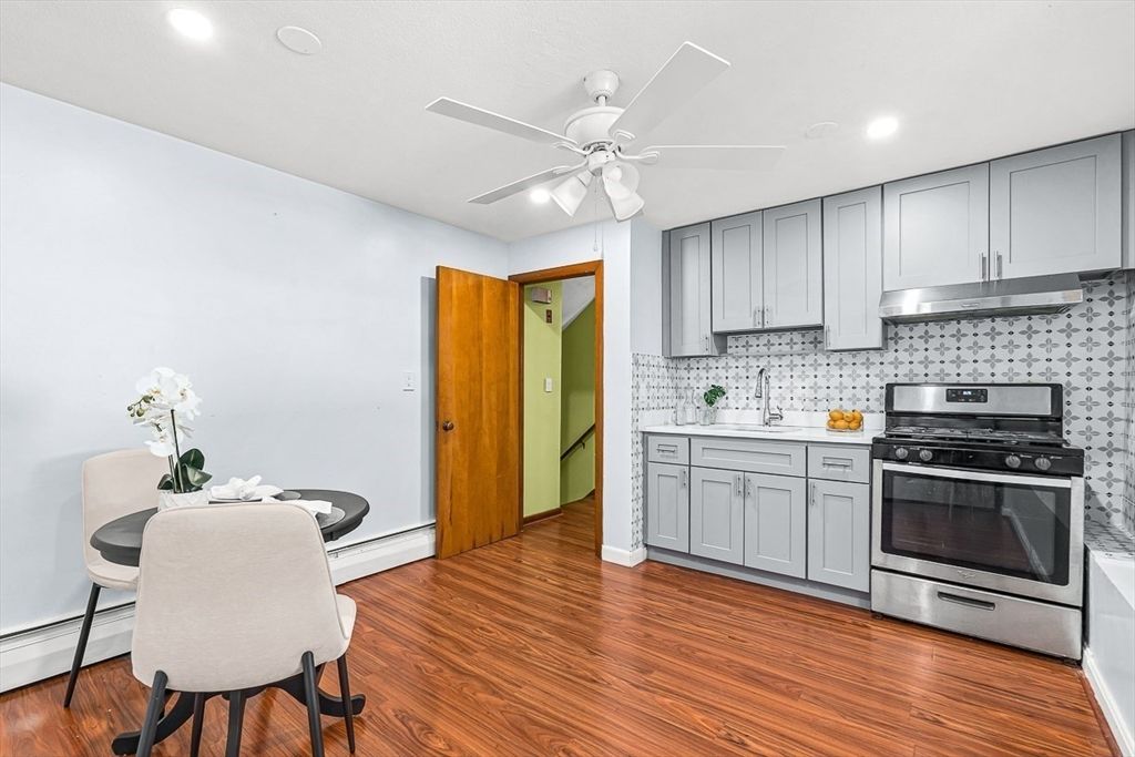 Dining room, Interior, Kitchen, Recessed Lighting, Stainless Steel Appliances, Wood Texture Flooring