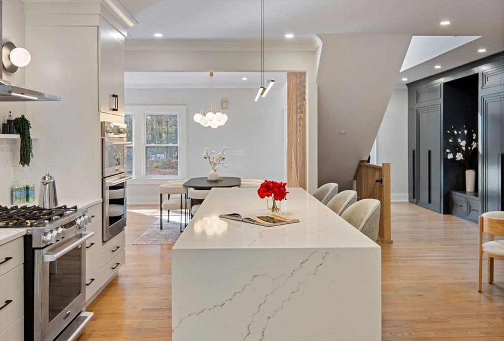 Dining room, Interior, Kitchen, Pendant Lights, Recessed Lighting, Stainless Steel Appliances, Wood Texture Flooring
